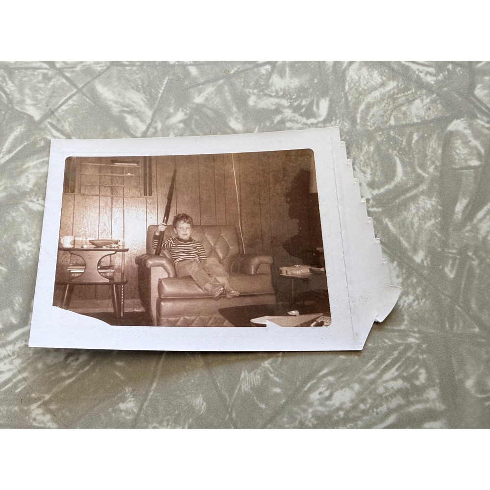 Vintage Polaroid Photo Boy with Gun 1970s Wood Panel Wall Snapshot Jay Found Art